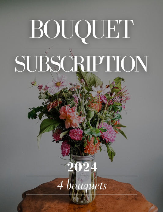 A bouquet on a side table. Four Bouquet Subscription for 2024.
